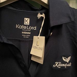 Kate Lord Golf- navy blue sleeveless top with collar